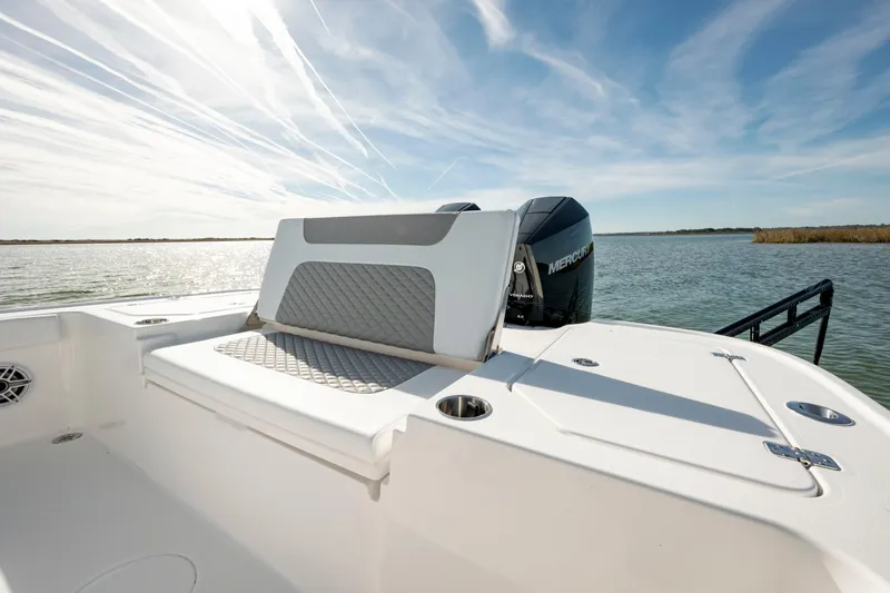  Yacht Photos Pics 2024 Caymas 281 HB boat with Mercury engine on a sunny day.