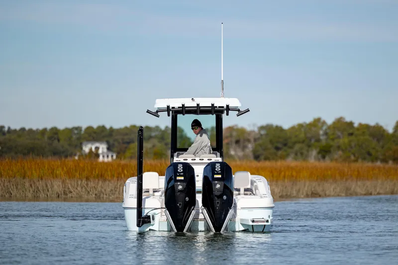  Yacht Photos Pics 2024 Caymas 281 HB boat on water with dual engines.