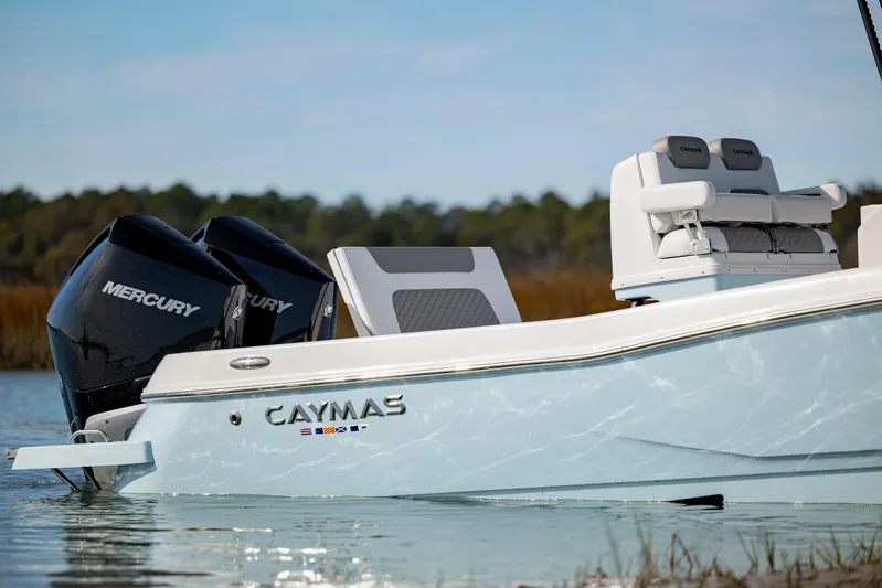  Yacht Photos Pics 2024 Caymas 281 HB boat with dual Mercury engines on the water.
