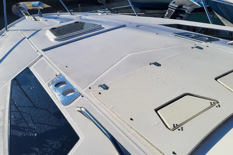  Yacht Photos Pics 2018 Regal 35 Sport Coupe deck with hatches and stainless steel fittings.