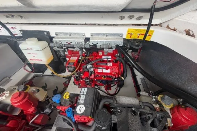  Yacht Photos Pics Engine compartment of a 2018 Regal 35 Sport Coupe, showcasing detailed mechanical components.