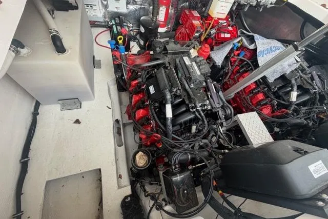  Yacht Photos Pics Engine compartment of a 2018 Regal 35 Sport Coupe with visible components and wiring.