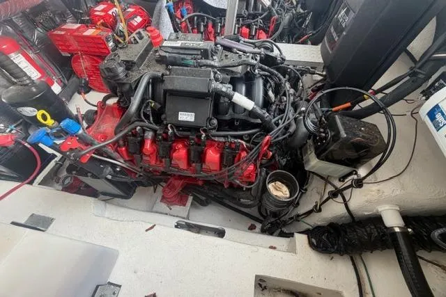  Yacht Photos Pics Engine compartment of a 2018 Regal 35 Sport Coupe with visible components and wiring.