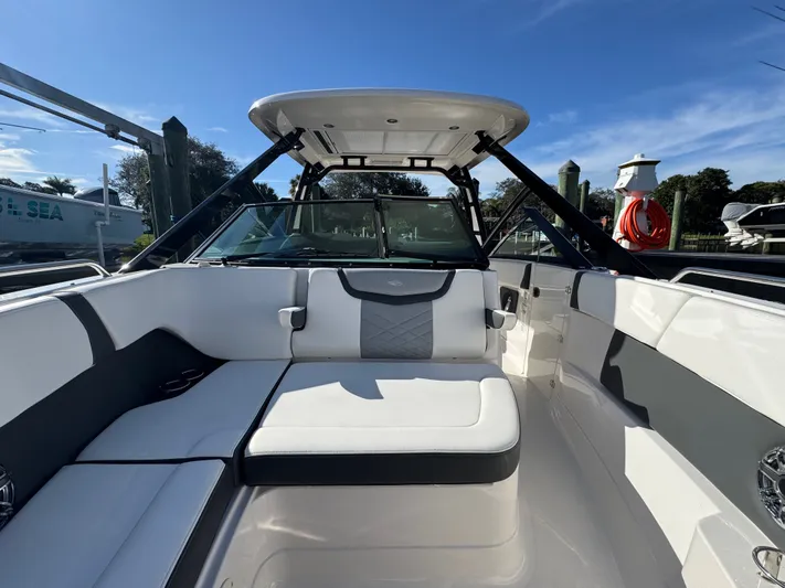  Yacht Photos Pics Interior of 2023 Chaparral 280 OSX with luxurious seating arrangement.