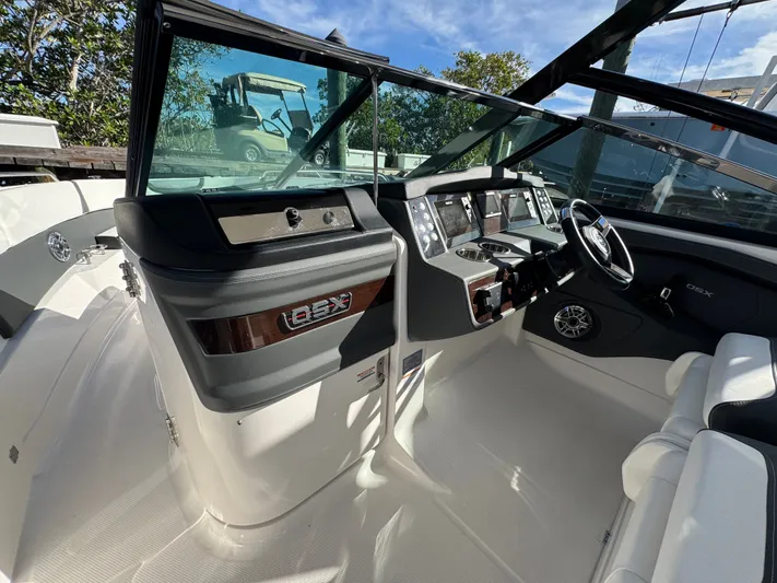  Yacht Photos Pics Interior of 2023 Chaparral 280 OSX boat with modern helm console.