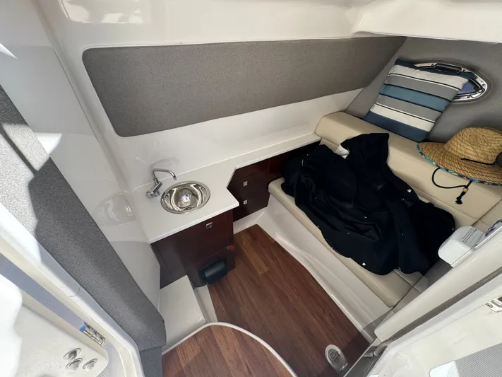  Yacht Photos Pics Interior of 2023 Chaparral 280 OSX with seating and sink.