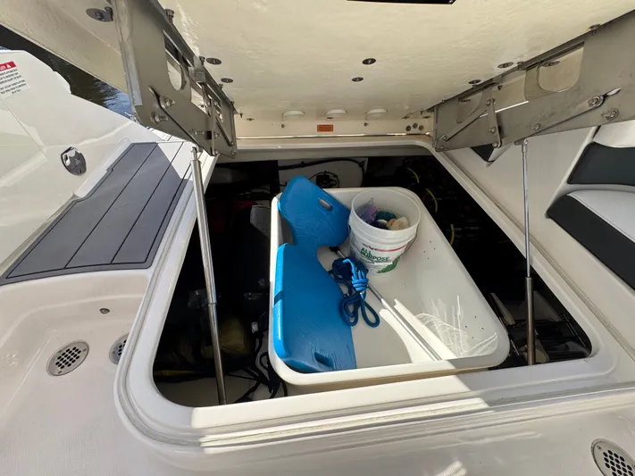 Yacht Photos Pics Storage compartment in Chaparral 280 OSX boat, 2023 model.