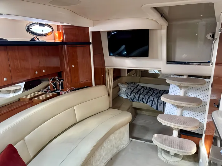  Yacht Photos Pics Interior of 2006 Sea Ray 340 Sundancer yacht with beige seating and modern amenities.