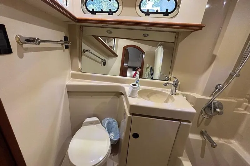  Yacht Photos Pics 2003 Cruisers Yachts 3750 Motoryacht bathroom with sink, toilet, and shower.