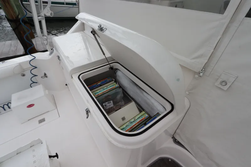  Yacht Photos Pics Open storage compartment on 2007 Cabo 40 Hardtop Express boat deck.