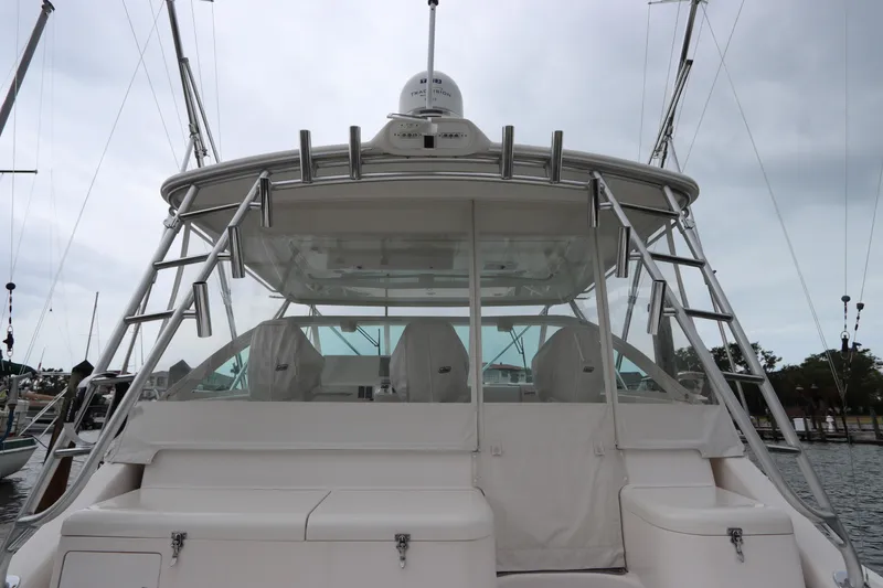  Yacht Photos Pics 2007 Cabo 40 Hardtop Express yacht with sleek design and spacious seating area.