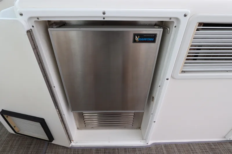  Yacht Photos Pics Stainless steel refrigerator on 2007 Cabo 40 Hardtop Express boat.