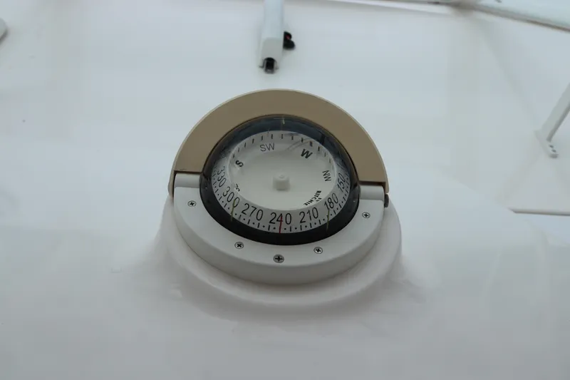  Yacht Photos Pics Compass on 2007 Cabo 40 Hardtop Express boat dashboard.