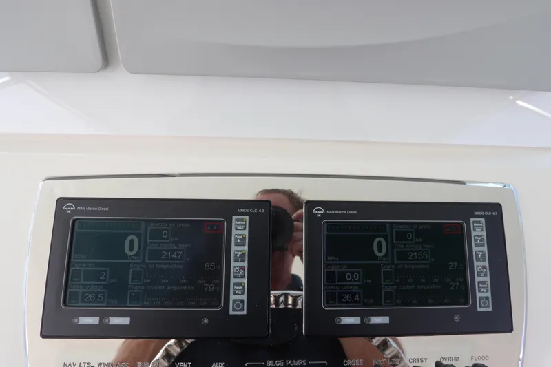  Yacht Photos Pics Dashboard of a 2007 Cabo 40 Hardtop Express with dual electronic displays.