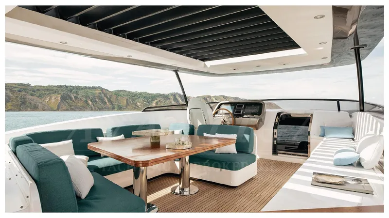  Yacht Photos Pics Luxurious Azimut Magellano 25M yacht interior, featuring elegant seating and a scenic ocean view.