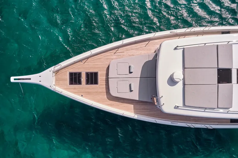  Yacht Photos Pics Aerial view of 2026 Omikron Yachts OT-60 on turquoise water.