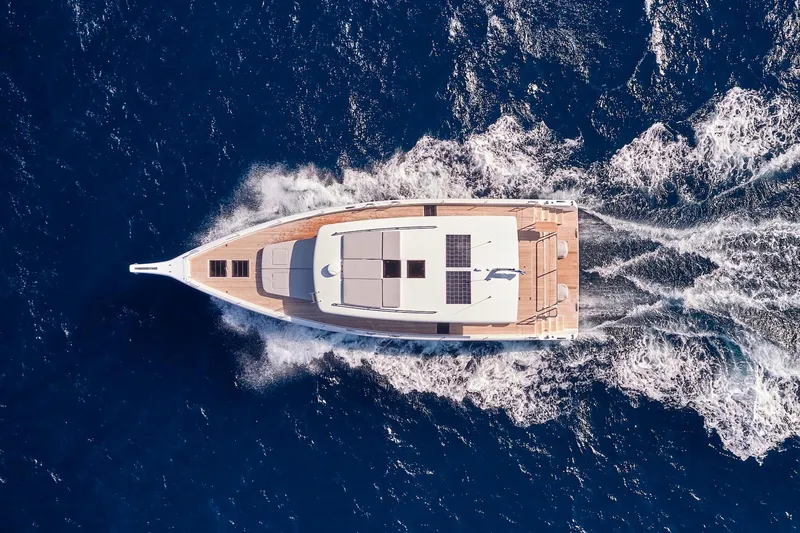  Yacht Photos Pics Aerial view of 2026 Omikron Yachts OT-60 cruising on open sea.