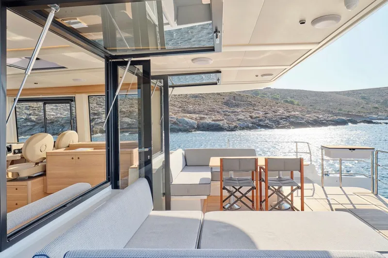  Yacht Photos Pics Luxurious 2026 Omikron Yachts OT-60 interior with scenic ocean view.