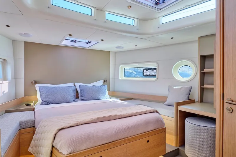  Yacht Photos Pics Luxurious cabin interior of 2026 Omikron Yachts OT-60 with modern design and natural light.