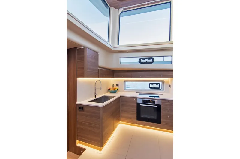  Yacht Photos Pics Luxurious kitchen interior of 2026 Omikron Yachts OT-60, featuring modern appliances and sleek design.