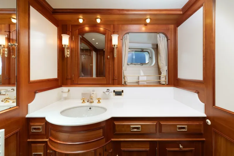 Catalina Yacht Photos Pics Luxurious wooden bathroom interior on 2001 Vitters Aft Cockpit yacht, featuring elegant fixtures and lighting.