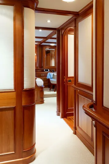 Catalina Yacht Photos Pics Luxurious wooden interior of a 2001 Vitters Aft Cockpit yacht, featuring elegant paneling and soft lighting.