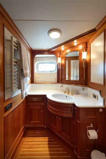 Catalina Yacht Photos Pics Luxurious wooden bathroom interior on 2001 Vitters Aft Cockpit yacht.