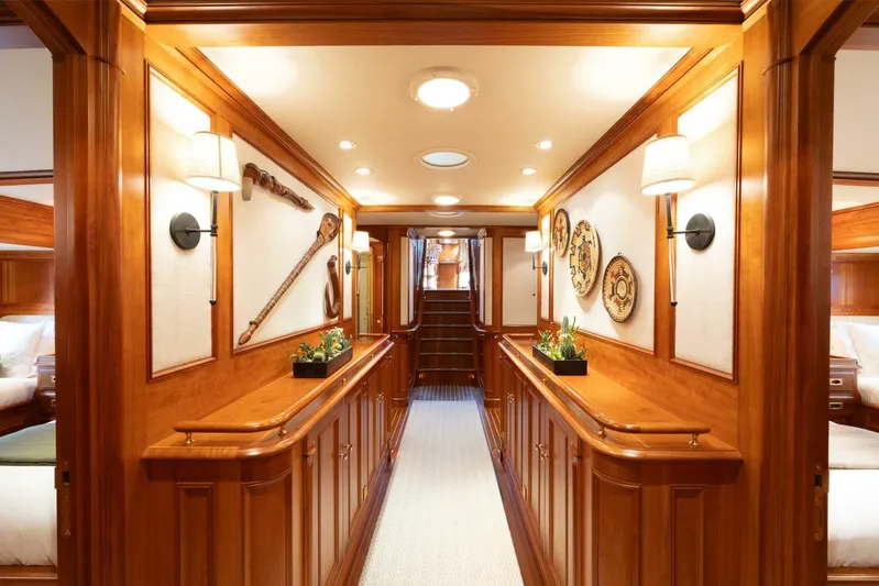 Catalina Yacht Photos Pics Luxurious wooden interior of 2001 Vitters Aft Cockpit yacht, featuring elegant decor and lighting.