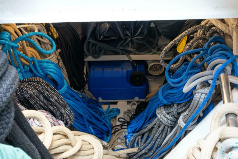 Catalina Yacht Photos Pics Storage compartment filled with colorful ropes on a 2001 Vitters Aft Cockpit yacht.
