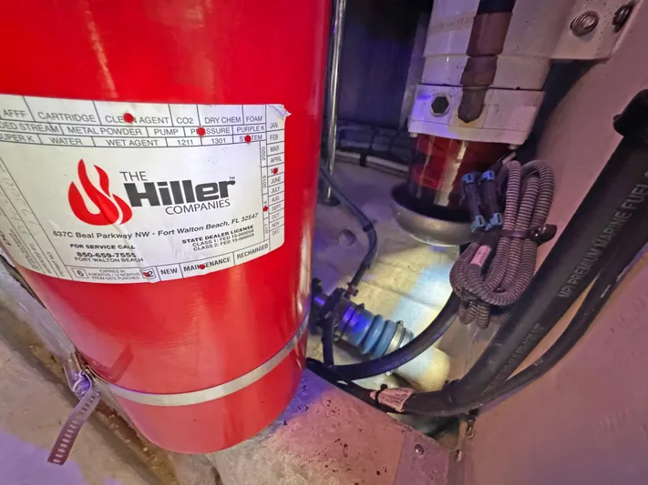 Devine Intervention Yacht Photos Pics Fire extinguisher in 2007 Sea Ray 44 Sedan Bridge engine room.