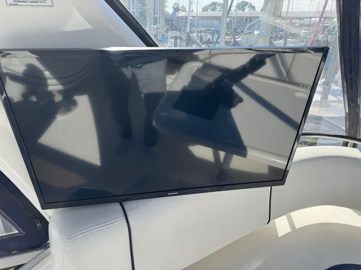 Devine Intervention Yacht Photos Pics Flat-screen TV on 2007 Sea Ray 44 Sedan Bridge yacht interior.