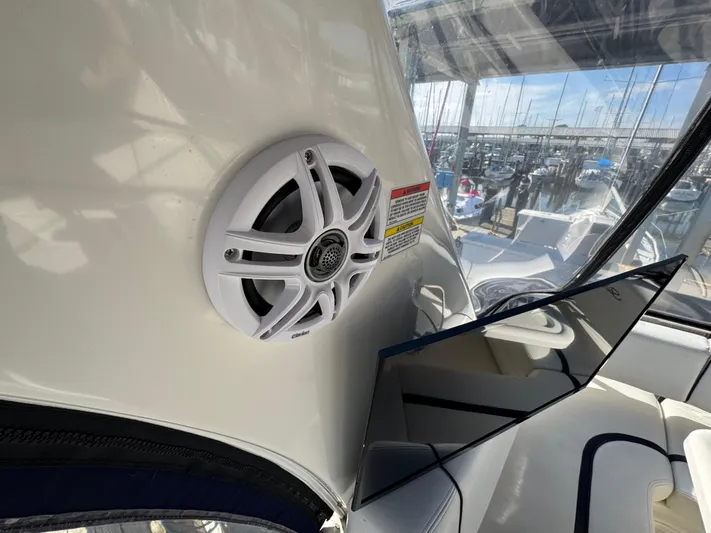 Devine Intervention Yacht Photos Pics Speaker and seating area on 2007 Sea Ray 44 Sedan Bridge yacht.