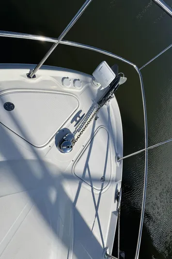 Devine Intervention Yacht Photos Pics 2007 Sea Ray 44 Sedan Bridge boat deck with anchor and railing.