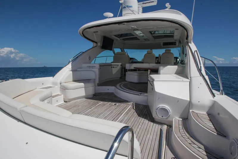  Yacht Photos Pics Luxurious 2012 Sea Ray 580 Sundancer yacht with spacious deck and seating area.
