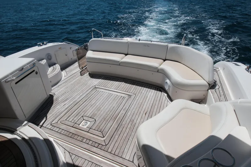  Yacht Photos Pics Luxurious 2012 Sea Ray 580 Sundancer yacht deck with elegant seating and ocean view.