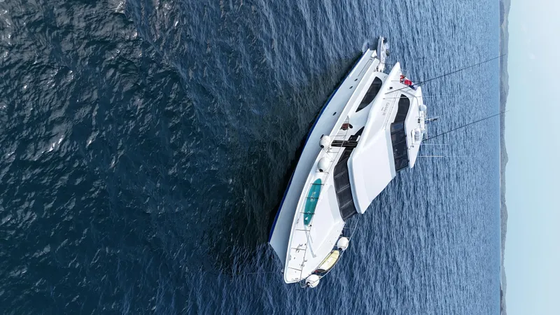  Yacht Photos Pics Luxurious 2000 Cheoy Lee CUSTOM 92 yacht cruising on open sea.