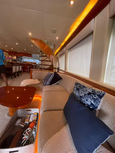  Yacht Photos Pics Luxurious interior of 2000 Cheoy Lee CUSTOM 92 yacht with elegant seating and ambient lighting.