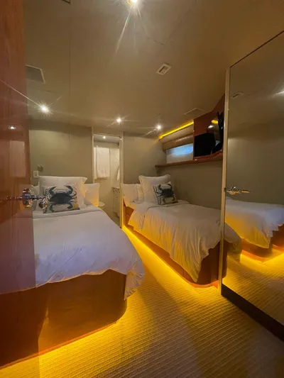  Yacht Photos Pics Luxurious Cheoy Lee CUSTOM 92 yacht bedroom, 2000 model, with ambient lighting and twin beds.