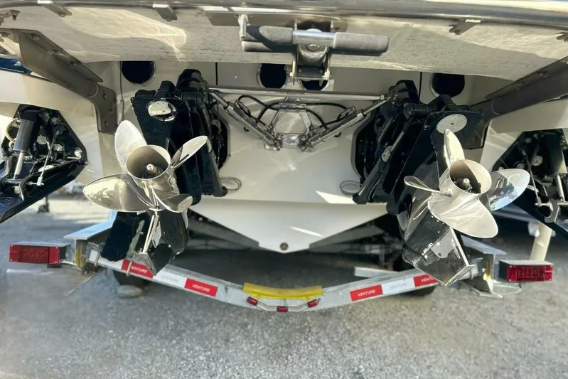  Yacht Photos Pics Rear view of 2005 Cobalt 343 boat showing dual propellers and trailer.