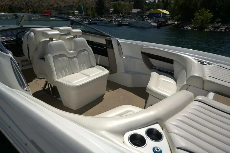  Yacht Photos Pics Luxurious interior of a 2005 Cobalt 343 boat with white leather seating.