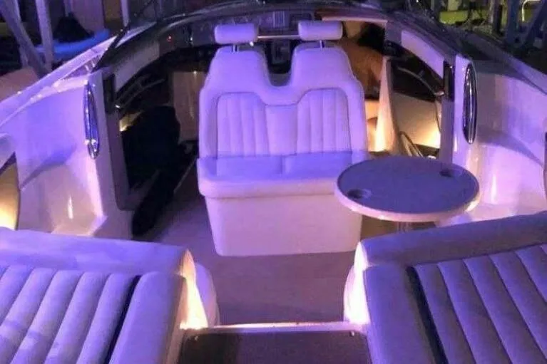  Yacht Photos Pics Luxurious interior of a 2005 Cobalt 343 boat with ambient lighting.