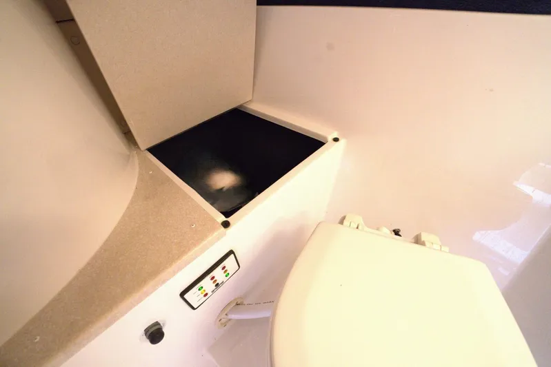  Yacht Photos Pics Interior of 2005 Cobalt 343 boat featuring a compact bathroom setup.