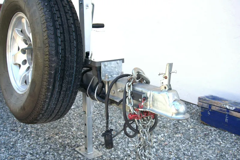  Yacht Photos Pics Trailer hitch with spare tire and chains, Cobalt 343, 2005 model.