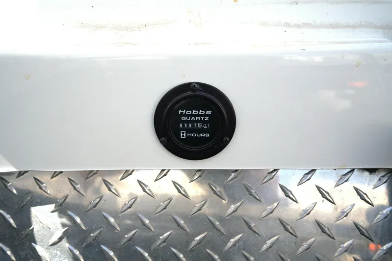  Yacht Photos Pics Hobbs quartz hour meter on 2005 Cobalt 343, mounted on diamond plate surface.