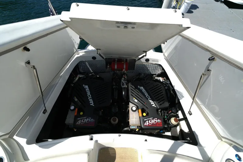  Yacht Photos Pics Open engine compartment of 2005 Cobalt 343 boat with twin Mercury engines.