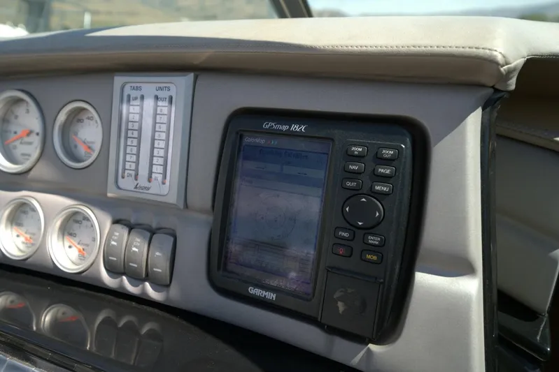  Yacht Photos Pics Dashboard of a 2005 Cobalt 343 with gauges and Garmin GPS navigation system.