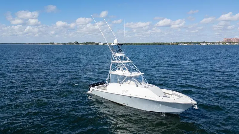  Yacht Photos Pics 2015 SeaVee 430 Fisharound boat on open water under blue sky.