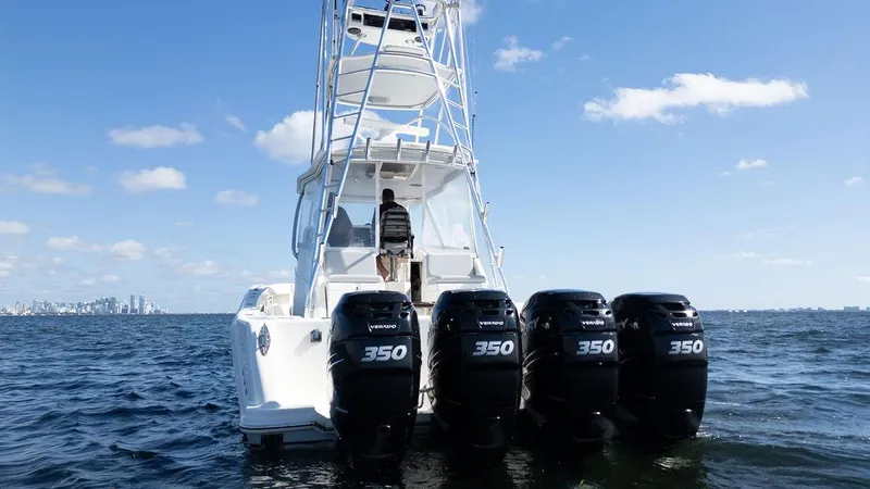  Yacht Photos Pics 2015 SeaVee 430 Fisharound boat with four powerful engines on open water.