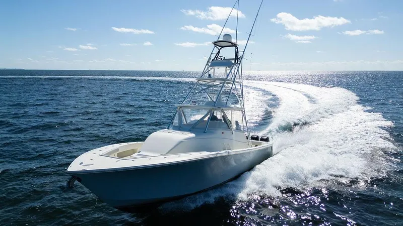  Yacht Photos Pics 2015 SeaVee 430 Fisharound cruising on open ocean, creating a dynamic water trail.