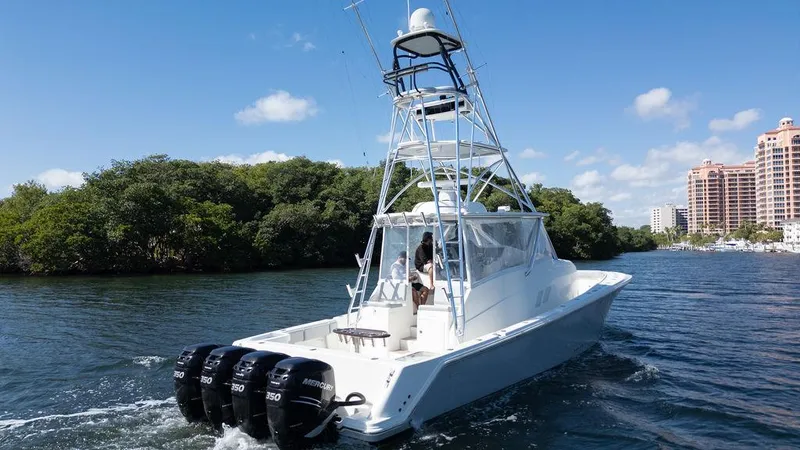  Yacht Photos Pics 2015 SeaVee 430 Fisharound boat cruising on a sunny day with four engines.